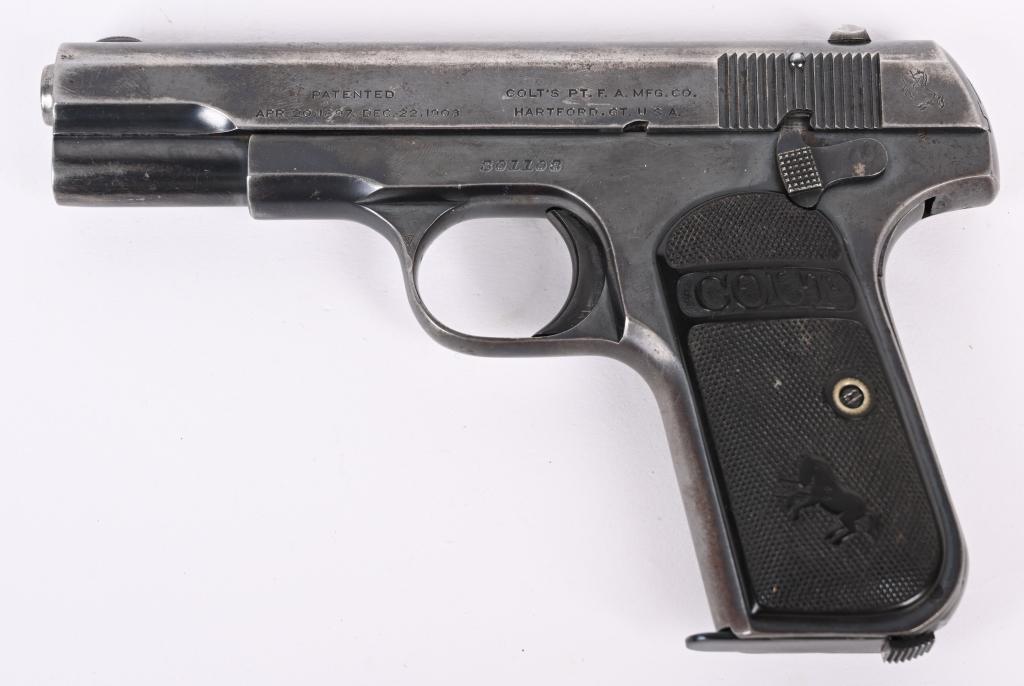 COLT MODEL 1903 SEMI AUTO PISTOL: SERIAL 301108. BARREL 3.5" CALIBER .32 ACP. MADE IN 1919. Standard model with blue finish, Colt logo gutta percha grips, fixed sights and one full blue unmarked magazine. Condition. Grips are excellen