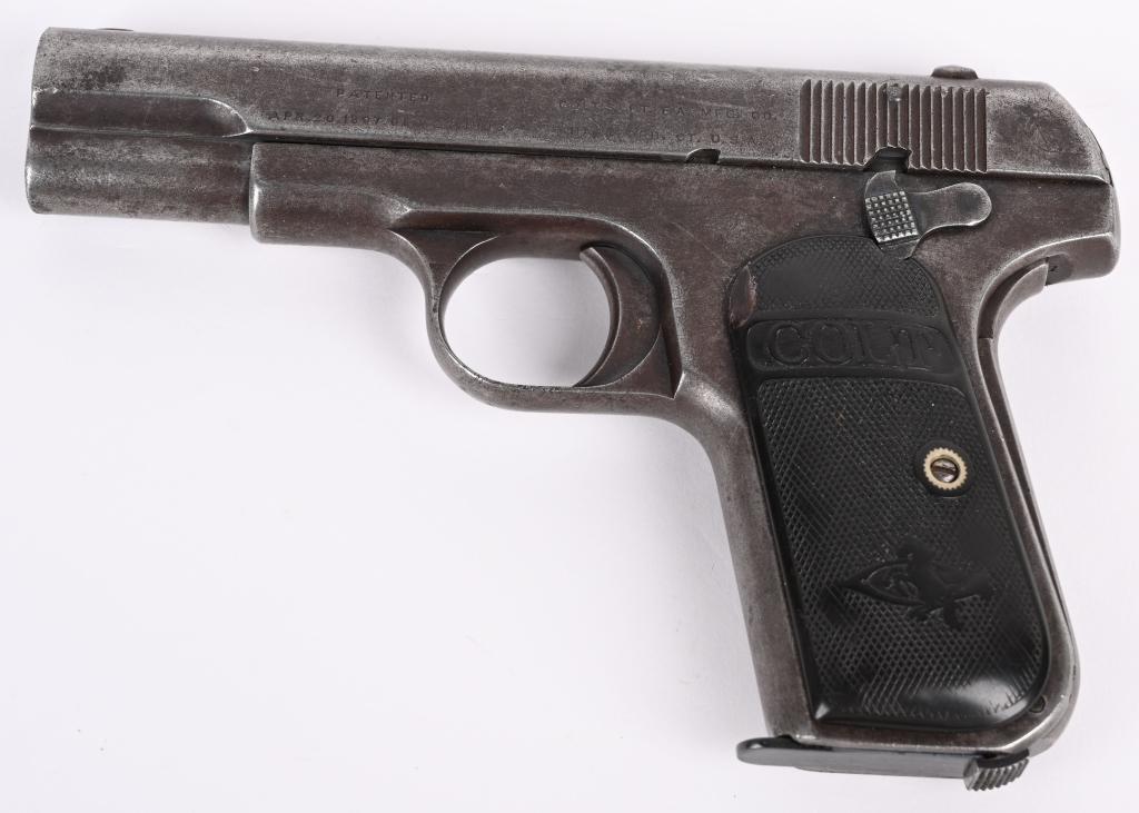 COLT MODEL 1908 SEMI AUTO .380 PISTOL: SERIAL 4310. BARREL 3 3/4". CALIBER .380 MADE IN 1909 2ND YEAR. Standard gun with deep legends but no original finish, basically a smooth dark patina with early Colt gutta percha grips that show match