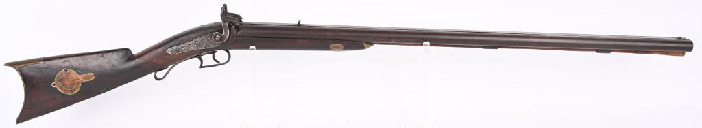 ANTIQUE DROP LOCK COMBO GUN: Features a .40 bore rifled and 28 bore smooth, percussion, back locks marked Golcher, walnut half stock, left side cheek piece, right side patch box, brass furniture, rifle sights. Metal is brown pati