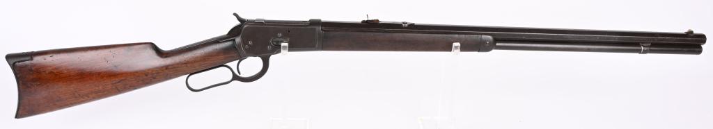 WINCHESTER MODEL 1892 LEVER ACTION RIFLE: SERIAL 247721. BARREL 24". CALIBER 38-40. MADE IN 1905. Features octagon barrel, full magazine, Marbles sporting sight, walnut stock, rifle butt. Condition. Metal is rich patina. Barrel legends are sh