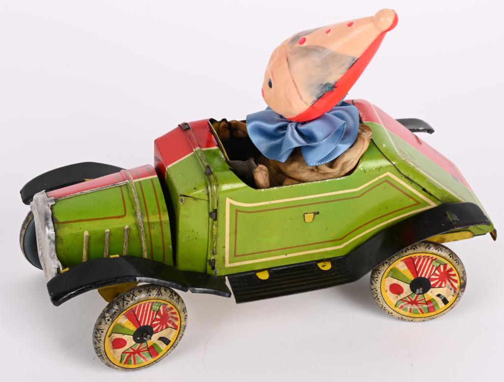 JAPAN TIN & CELLULOID CLOWN ECENTRIC CAR (1 of 6)
