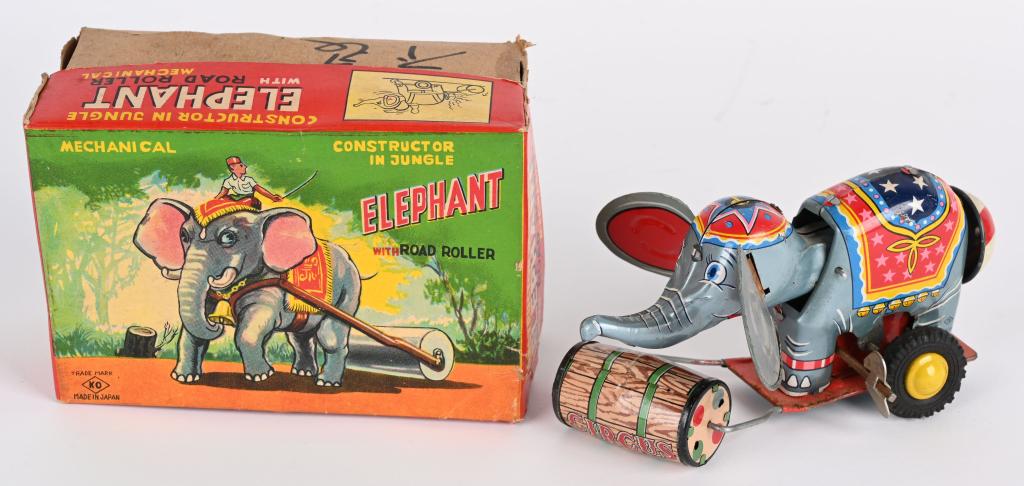 JAPAN TIN WINDUP ELEPHANT JUNGLE CONSTRUCTOR: Japan tin windup Elephant Jungle Constructor. All original with nice colors. windup works. Boxed 6" Excellent
