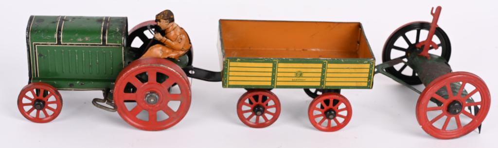 GUNTHERMANN TIN WINDUP TRACTOR w/ WAGON & RAKE (1 of 6)