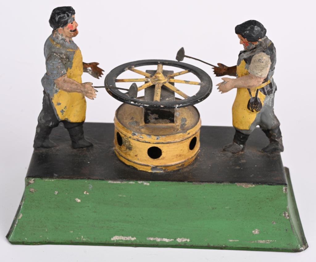 GERMAN WINDUP HAND PAINTED BLACKSMITHS (1 of 5)