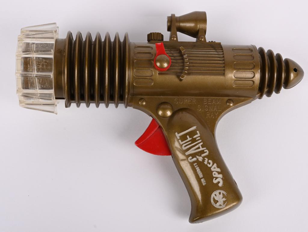 MARX TOM CORBETT SPACE CADET SIGNAL RAY GUN: Tom Corbett Signal Ray Gun. All original. Has small break on side selector. 8" Excellent