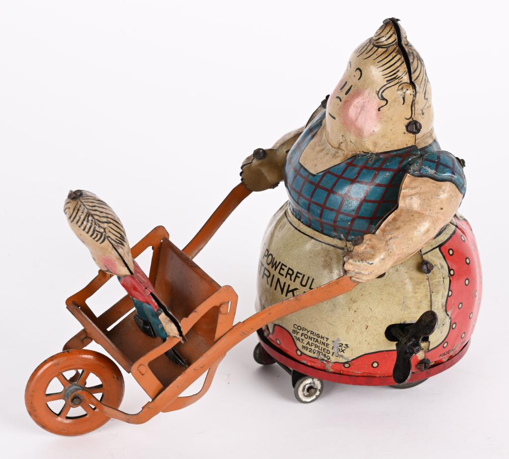 NIFTY TIN WINDUP POWERFUL KATRINKA & JIMMY (1 of 5)