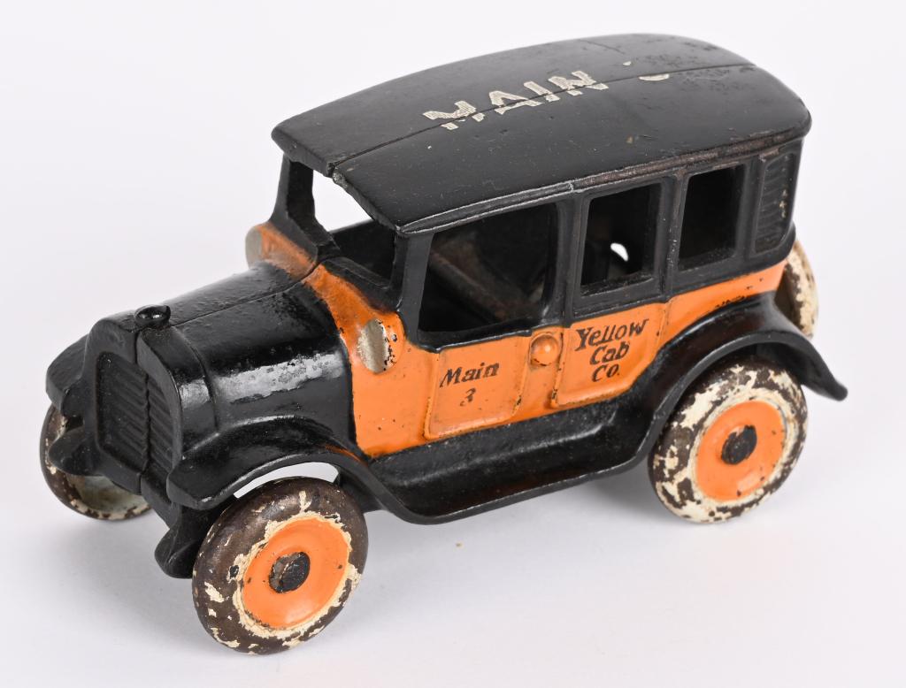 ARCADE CAST IRON YELLOW CAB w/ ADVERTISING (1 of 5)