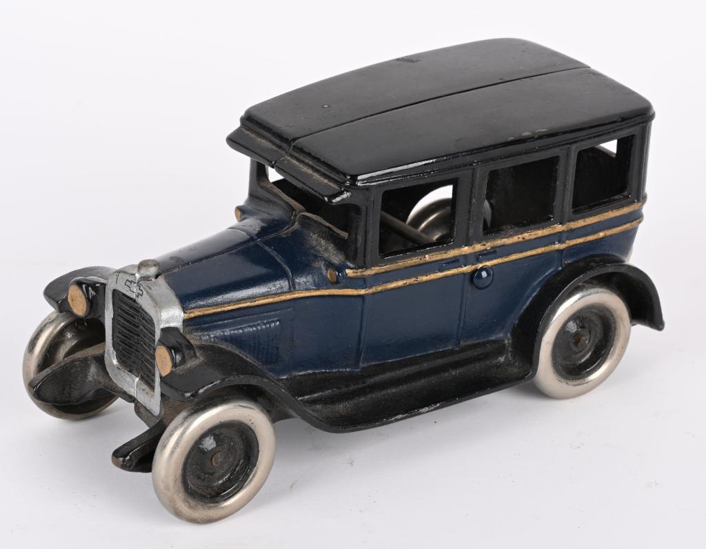 ARCADE CAST IRON CHEVY TWO STRIPE SEDAN (1 of 6)