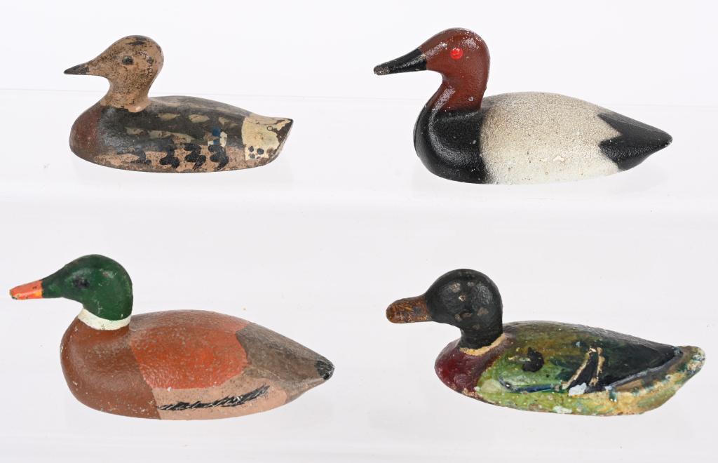 4- CAST IRON DUCK PAPERWEIGHTS (1 of 2)