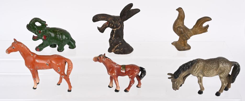 6- CAST IRON PAPERWEIGHTS & BOTTLE OPENERS (1 of 4)