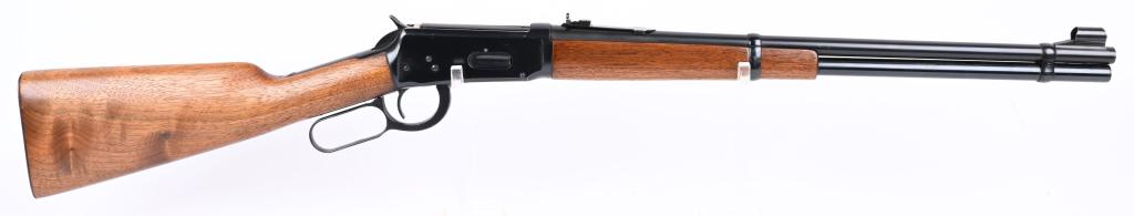 NR-MT WAR ERA WINCHESTER MODEL 1894 CARBINE: SERIAL NUMBER 1373190. BARREL 20". CALIBER 30-30. MADE 1942-1948. Standard features include full magazine, two bands, Winchester sporting sights, walnut stocks, blue finish. Condition. Wood has few li