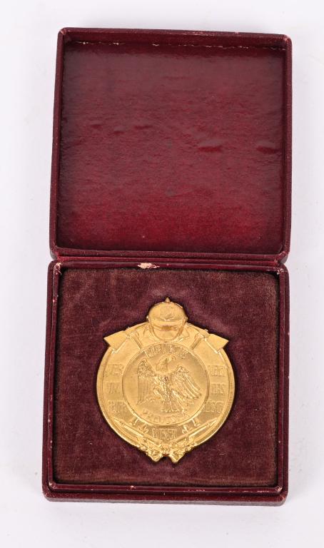 WWI IMPERIAL GERMAN CASED FIRE POLICE BADGE WW1: Imperial German Cased 25 Year Meritorious Faithful Fire/Police Service Badge in Gilded Bronze in near mint condition This badge was instituted in 1908. Case measures 2 1/8 X 2 1/8 