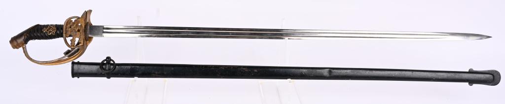 WW1 M89 PATTERN PRUSSIAN INFANTRY OFFICER'S SWORD: M89 pattern Officer's sword with a double fuller blade is about 30 1/2 long. Blade is in nice clean condition. Folding brass basket with "Prussian" eagle. Beautiful grip complete with all its original