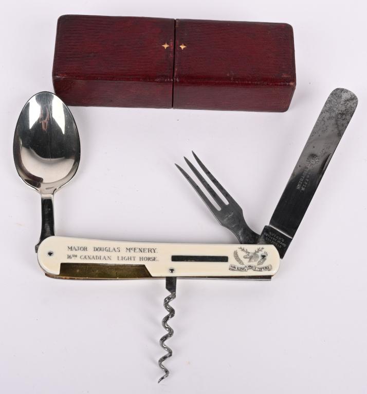 MAPPIN BROS. MILITARY ENGRAVED COMBINATION KNIFE: (MAPPIN BROS); a rare military issue engraved ivory combination knife, fork, spoon and corkscrew, the body with pinned locators dividing into two sections, the front inscribed 'Major Douglas McEnery 1