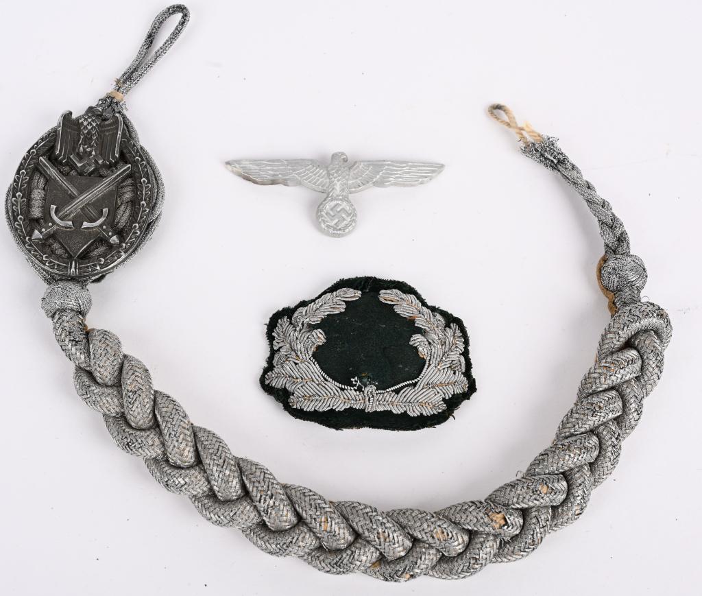 WWII NAZI GERMAN WEHRMACHT INSIGNIA LOT LANYARD: WWII Nazi German insignia lot to include 1) WWII NAZI GERMAN 2ND PATTERN MARKSMANSHIP LANYARD. Army second pattern 1-4 grade type marksmanship lanyard badge and lanyard. The Lanyard shield is covered 