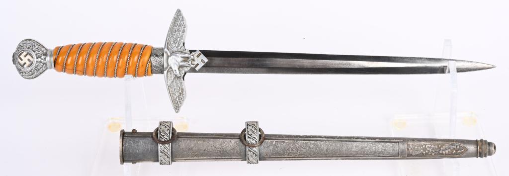 WWII NAZI GERMAN LUFTWAFFE OFFICERS DAGGER WW2: Roughly 29cm long, bright, nickel/silver plated, double edged, drop forged steel, stiletto style blade with a flat central plane. Maker marked to Carl Eickhorn. The leather washer is still intact. The