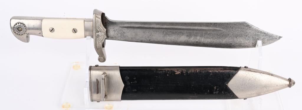 WWII NAZI GERMAN TENO DAGGER BY EICKHORN WW2: Broad, 25cm long, nickel/silver plated Bowie style blade with narrow fuller and false edge. Blade is grayed with light pitting. Reverse ricasso with nicely detailed, deeply acid etched TeNo style nati