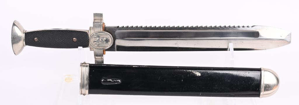 WWII NAZI GERMAN RED CROSS HEWER DAGGER WW2: The hewer features a roughly, 10 1/2", (26.6 cm), long, broad, squared, blunt tipped, nickel/silver plated, drop forged, steel construction blade with deep, wide, fullers, a staggered, saw-toothed, ed