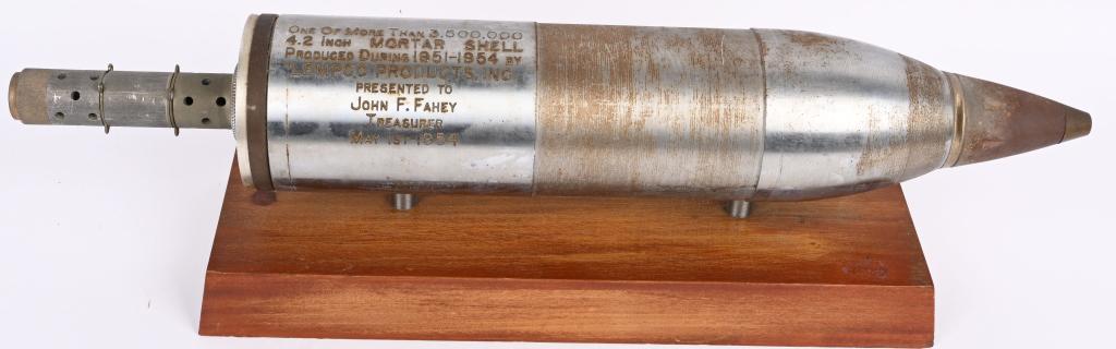 1954 DATED PRODUCTION TROPHY FOR 4.2 MORTAR LEMPCO: Artillery production trophy of a 4.2 mortar shell measuring 26 inches in total length with the dedication "One Of More Than 3,500,000 4.2 Inch MORTAR SHELL Produced During 1951-1954 By LEMPCO PRO