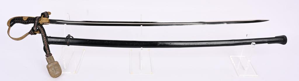 WWII NAZI GERMAN DOVE HEAD OFFICERS SWORD HOLLER: WWII German doves head dress sword maker marked F. W. Holler of Solingen Laurel leaf design in hilt with black wire wrapped celluloid grip. "P" knuckle bow and saddled back strap. Retains 95% repainte