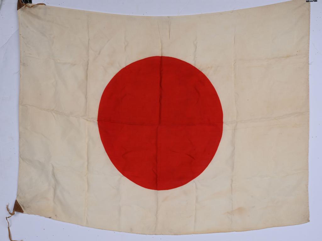 WWII JAPANESE LARGE NATIONAL FLAG WITH TIES WW2: A silk Japanese National flag is a printed flag measuring approximately 27 x 36. Nice untouched example.