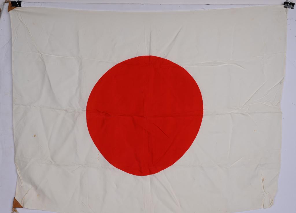 WWII JAPANESE LARGE NATIONAL FLAG WITH TIES WW2: A silk Japanese National flag is a printed flag measuring approximately 27 x 36. Nice untouched example.