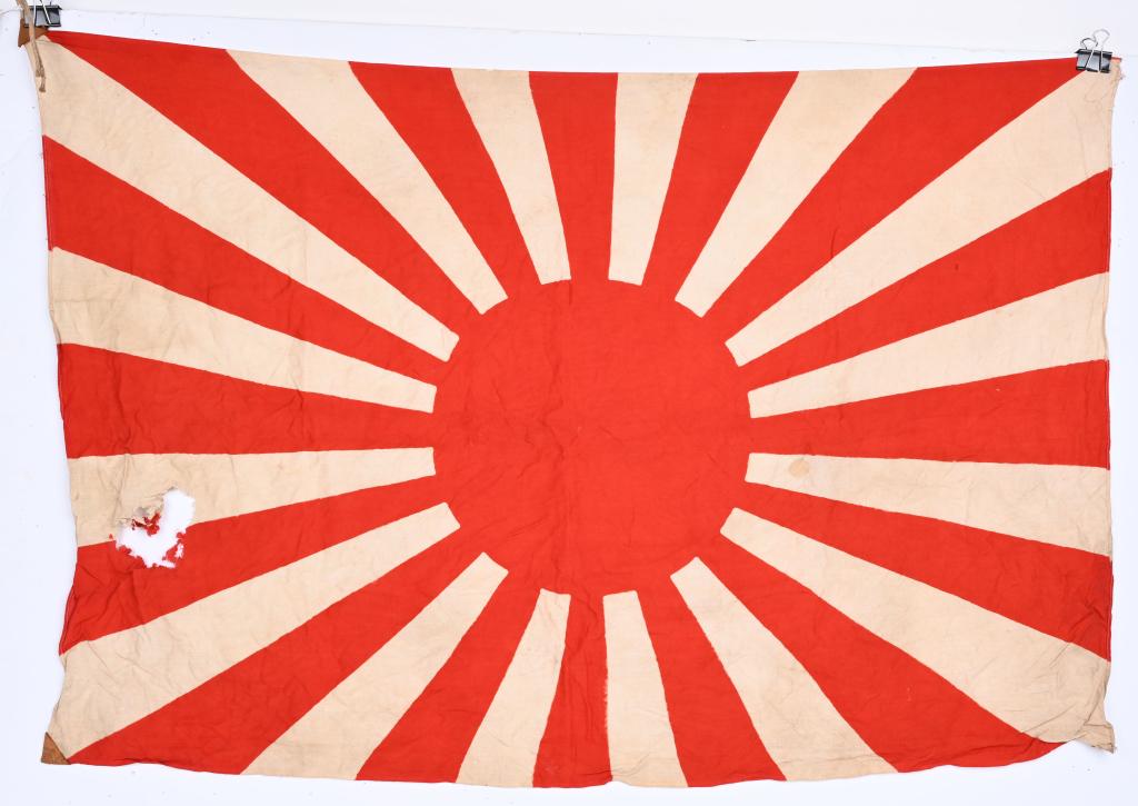 WWII LARGE JAPANESE RISING SUN FLAG WW2: A silk Japanese Rising Sun National Battle flag is a printed flag measuring approximately 27 x 48. Nice untouched examplewith a large hole to the side.