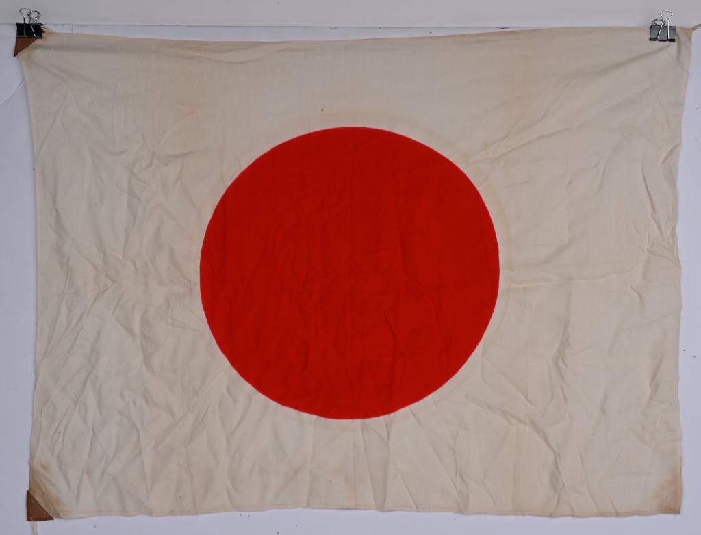 WWII JAPANESE LARGE NATIONAL FLAG WITH TIES WW2: A silk Japanese National flag is a printed flag measuring approximately 25 x 36. Nice untouched example.