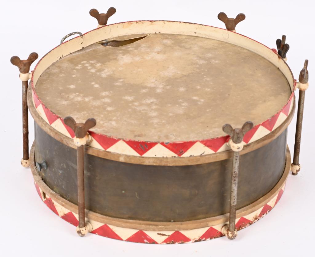 WWII NAZI GERMAN HITLER YOUTH HJ DRUM WW2: A 12.5" diameter and 5 1/4" drum with skins to either face separated by a 16.5cm tall brass surround with upper and lower metal bands. The thigh brace is riveted to the lower band beneath where the dr