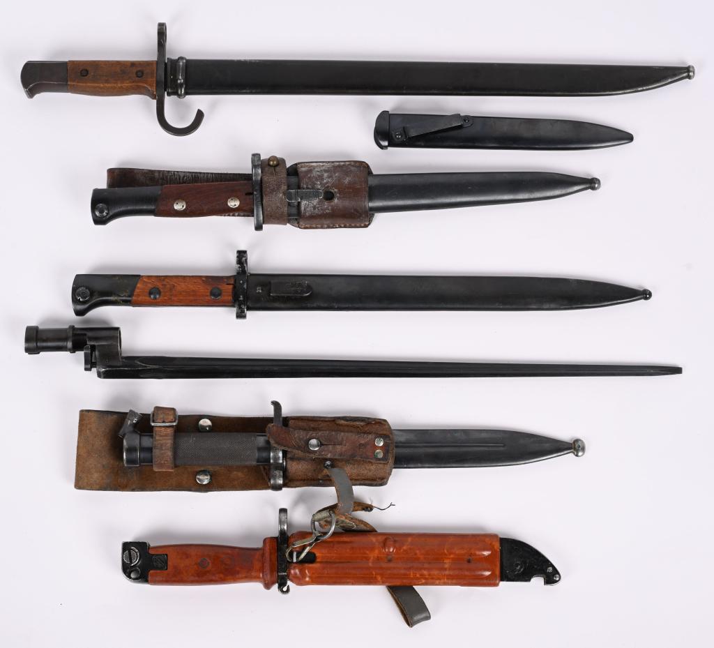 BAYONET LOT JAPANESE SWEDEN BULGARIA ITALIAN: Military Bayonet lot to include 1) (IJA) INFANTRY "TYPE 30" BAYONET. Serial number (24846) to the head of the pommel. The pommel’s button functions perfectly. The contoured wraparound wooden gri
