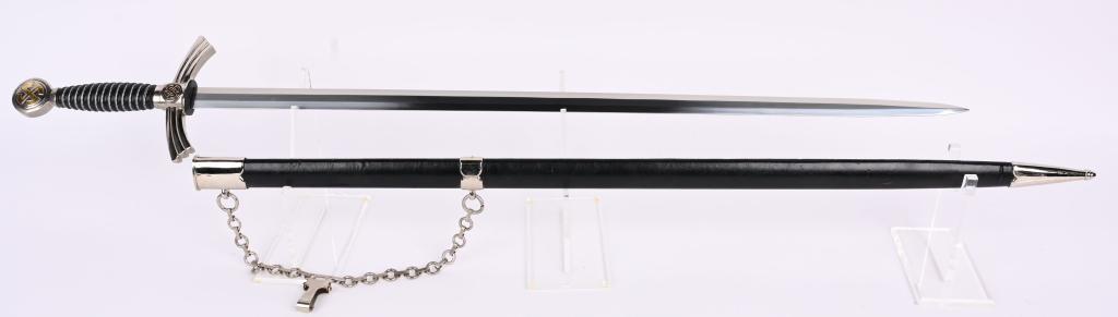 REPRODUCTION LUFTWAFFE SWORD W/ SCABBARD: Reproduction WWII Nazi German Luftwaffe Sword measuring 40 inches in total length and having the look of a 1st model dagger with chain. The blade is marked CHINA. 