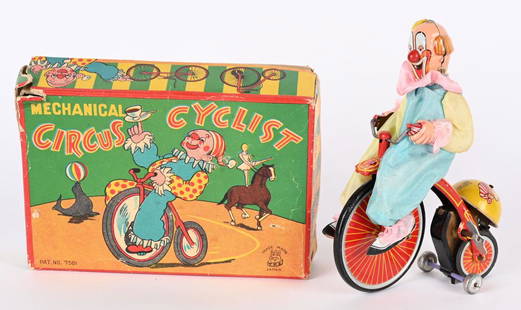 TPS TIN WINDUP CIRCUS CYCLIST w/ BOX: Japan tin windup Circus Cyclist. All original and complete with Clown and Bell. Very nice colors. Windup works. With complete Box with 1 small corner tear. 6 1/2" Excellent