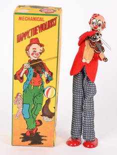 TPS TIN WINDUP HAPPY THE VIOLINIST w/ BOX: Japan tin windup Happy The Violinist. All original and complete Clown on Stilts. Very nice colors. Windup works. With nice complete Box. 9" Excellent