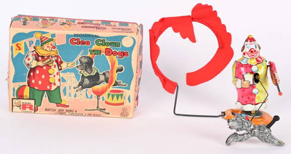 TPS TIN WINDUP CLEO CLOWN THE DOGS w/ BOX: Japan tin windup Cleo Clown The Dogs. All original and complete with Clown and Dog jumping thru flaming hoop . Very nice colors and graphics. Windup works. With nice complete Box that has small tear