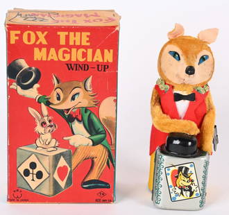 JAPAN WINDUP FOX THE MAGICIAN w/ BOX: Japan tin windup Fox The Magician. All original and complete. Fox makes Rabbit disappear under his top hat. Windup and action works. Comes with nice complete Box. 7" Excellent