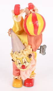 JAPAN TIN WINDUP HANDSTAND CLOWN: Japan tin windup hand stand clown. Complete and original. Windup works. 8 1/2", Near Mint