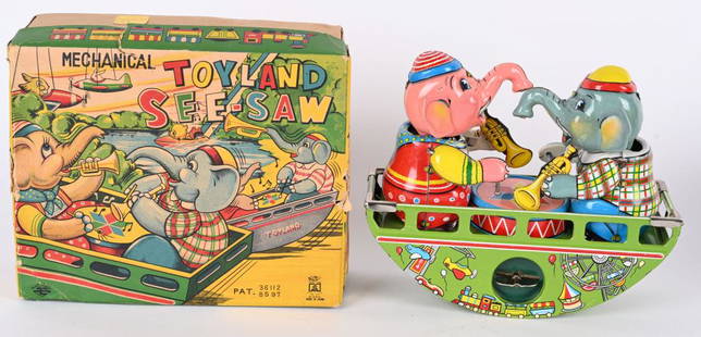 JAPAN TIN WINDUP PLAYLAND SEE SAW w/ BOX: Japan tin windup Playland See Saw. All original and complete with 2 Elephants. Nice colors and graphics. Windup works. With complete box with some edge wear. 7 1/2" Excellent