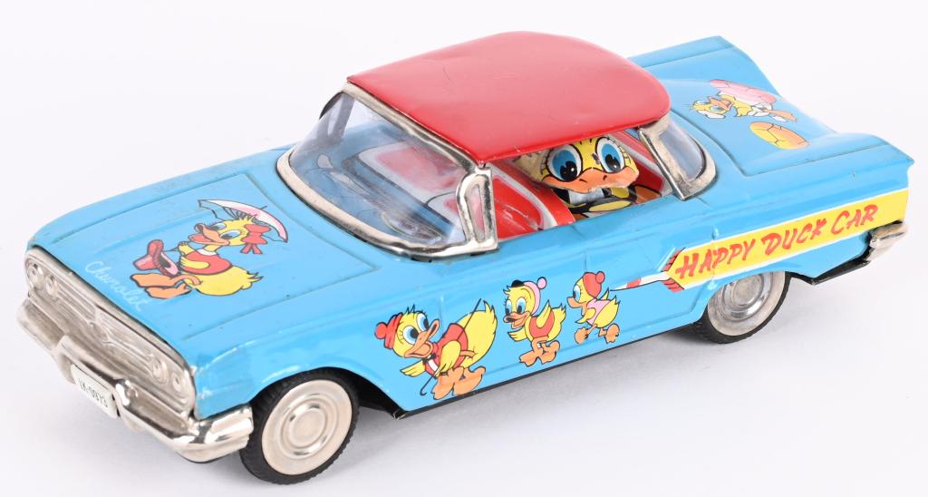JAPAN TIN FRICTION HAPPY DUCK CHEVROLET (1 of 4)
