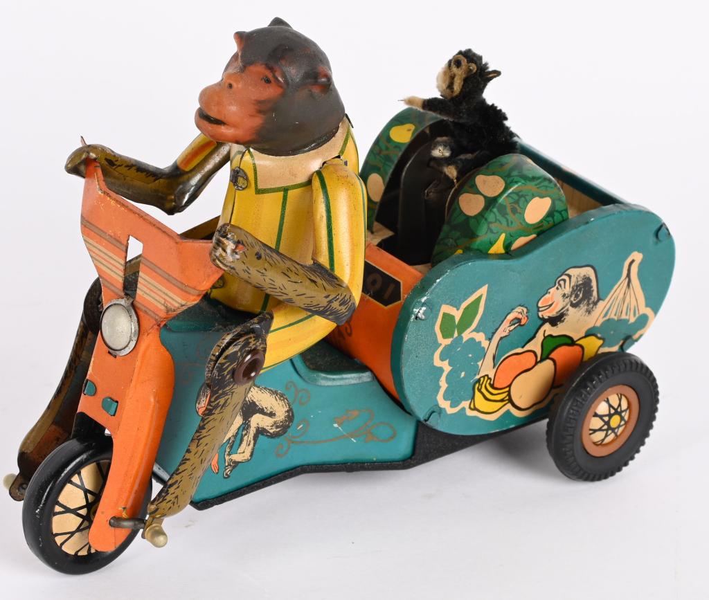 RED CHINA TIN FRICTION MONKEY CYCLE (1 of 4)