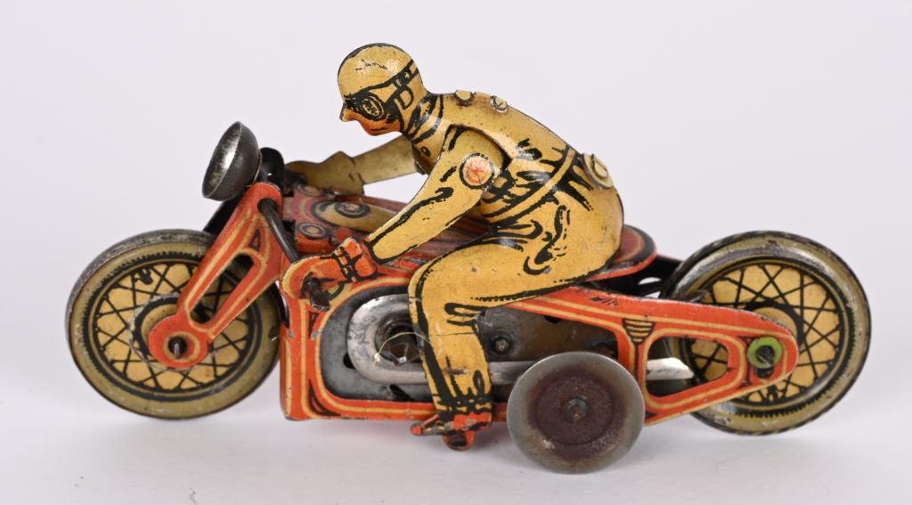 CKO TIN WINDUP MOTORCYCLE w/ RIDER (1 of 2)