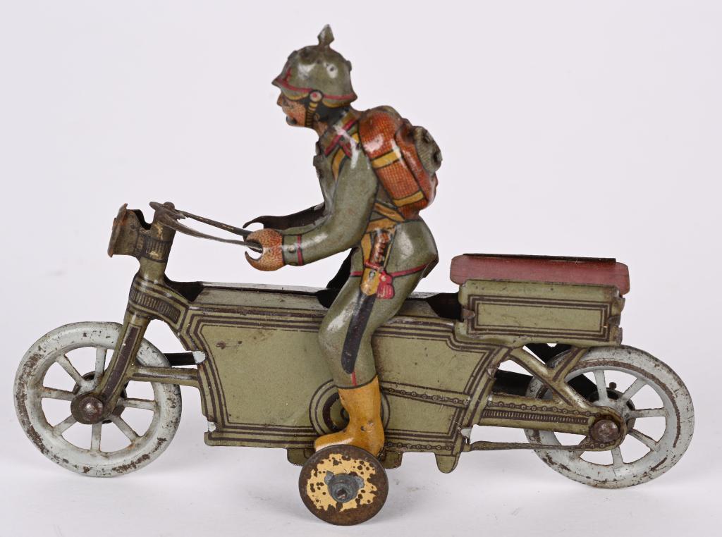 MEIER PENNY TOY SOLDIER ON MOTORCYCLE (1 of 2)