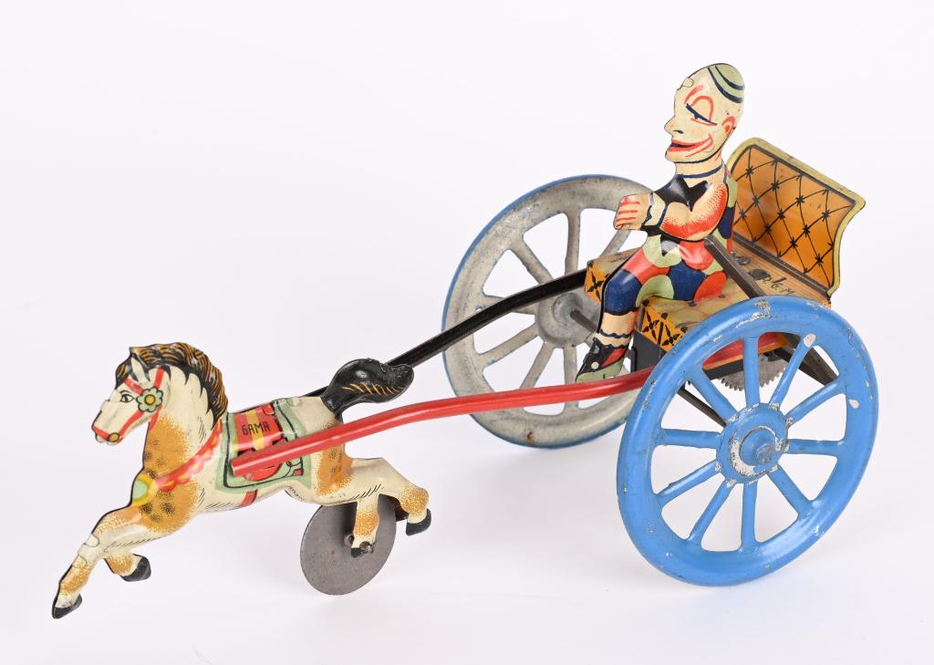 GAMA TIN WINDUP CLOWN IN HORSE CART (1 of 2)