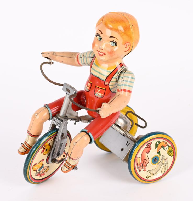 UNIQUE ART TIN WINDUP KIDDY CYCLIST (1 of 4)