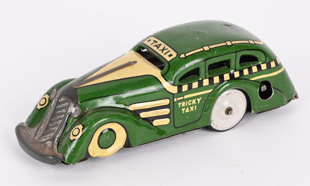 MARX TIN WINDUP TRICKY TAXI (1 of 3)