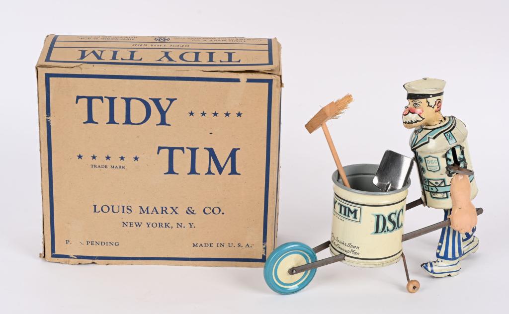 MARX TIN WINDUP TIDY TIM w/ BOX: marx tin windup Tidy Tim Street Sweeper. All original and complete. Comes with accessory Broom and Shovel. Toy looks virtually unplayed with condition. Windup works. Comes with Box clean Box with a fe