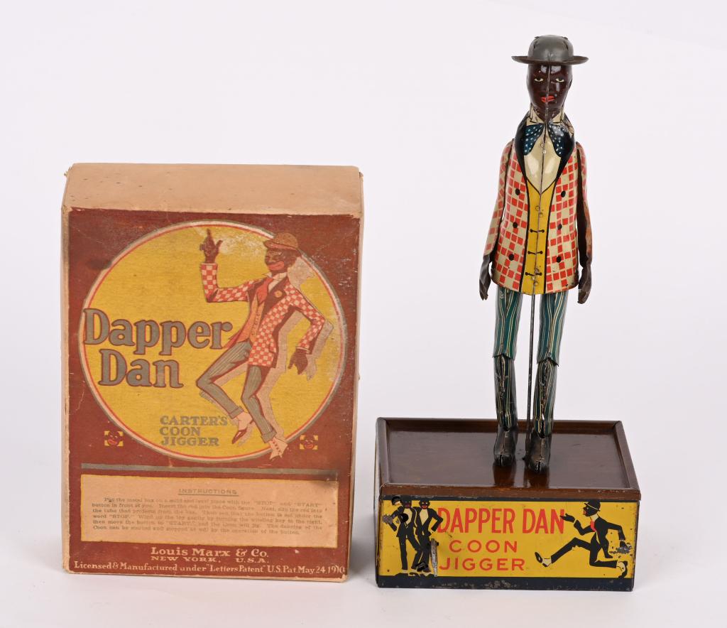MARX TIN WINDUP DAPPER DAN COON JIGGER w/ BOX: Marx tin windup Dapper Dan Carter's Coon Jigger. All original and complete with both arms. Toy has very nice colors. Windup works. With nice complete Box. 10" Excellent
