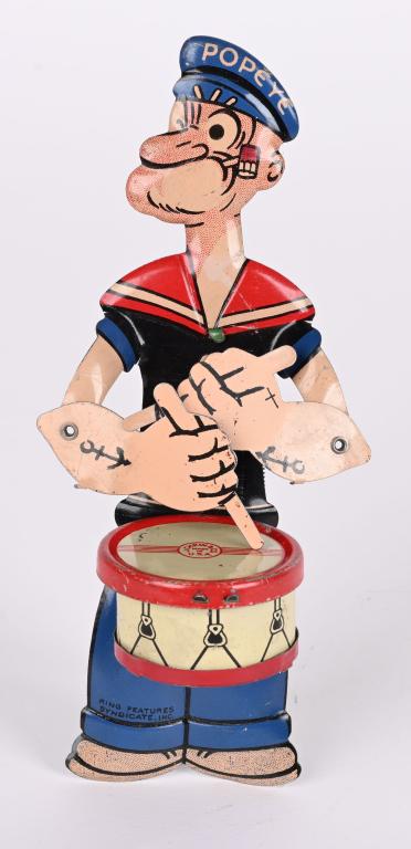 CHEIN TIN POPEYE DRUMMER: Chein tin Popeye Drummer. All original and complete with great colors. Toy shows virtually no wear. Toy has squeeze action to operate Popeye that works. A hard to find Popeye toy. 7" Excellent