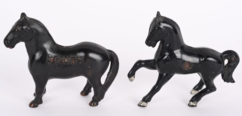 ARCADE CAST IRON BEAUTY & PRANCING HORSE BANKS: Arcade cast iron Beauty and Prancing Horse Still Banks. Both all original with great paint. No breaks or repairs. Largest 4 3/4" Excellent