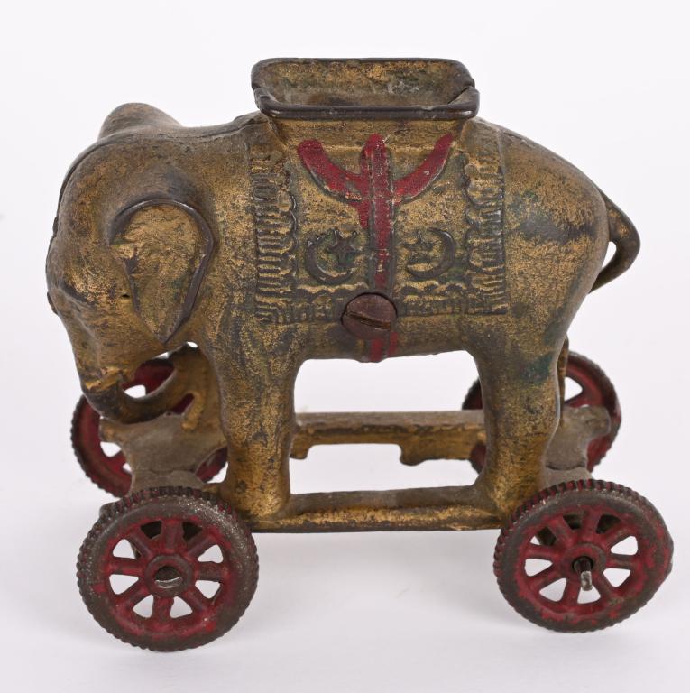 AC WILLIAMS CAST IRON ELEPHANT ON WHEELS BANK (1 of 2)