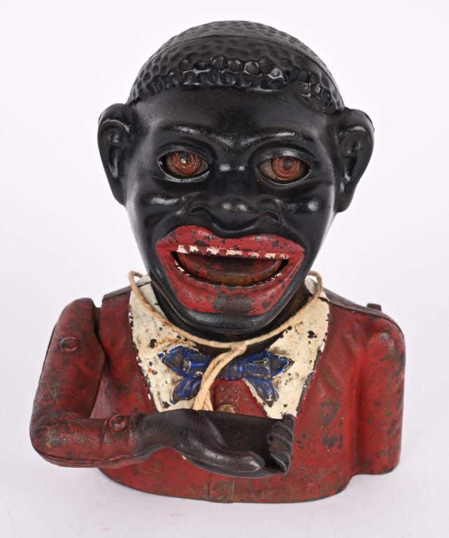HARPER CAST IRON JOLLY NIGGER MECHANICAL BANK: Harper cast iron Jolly Nigger Mechanical Bank. All original with decent paint. No breaks or repairs. Base plate with lock look replaced. 6 1/2" Very Good